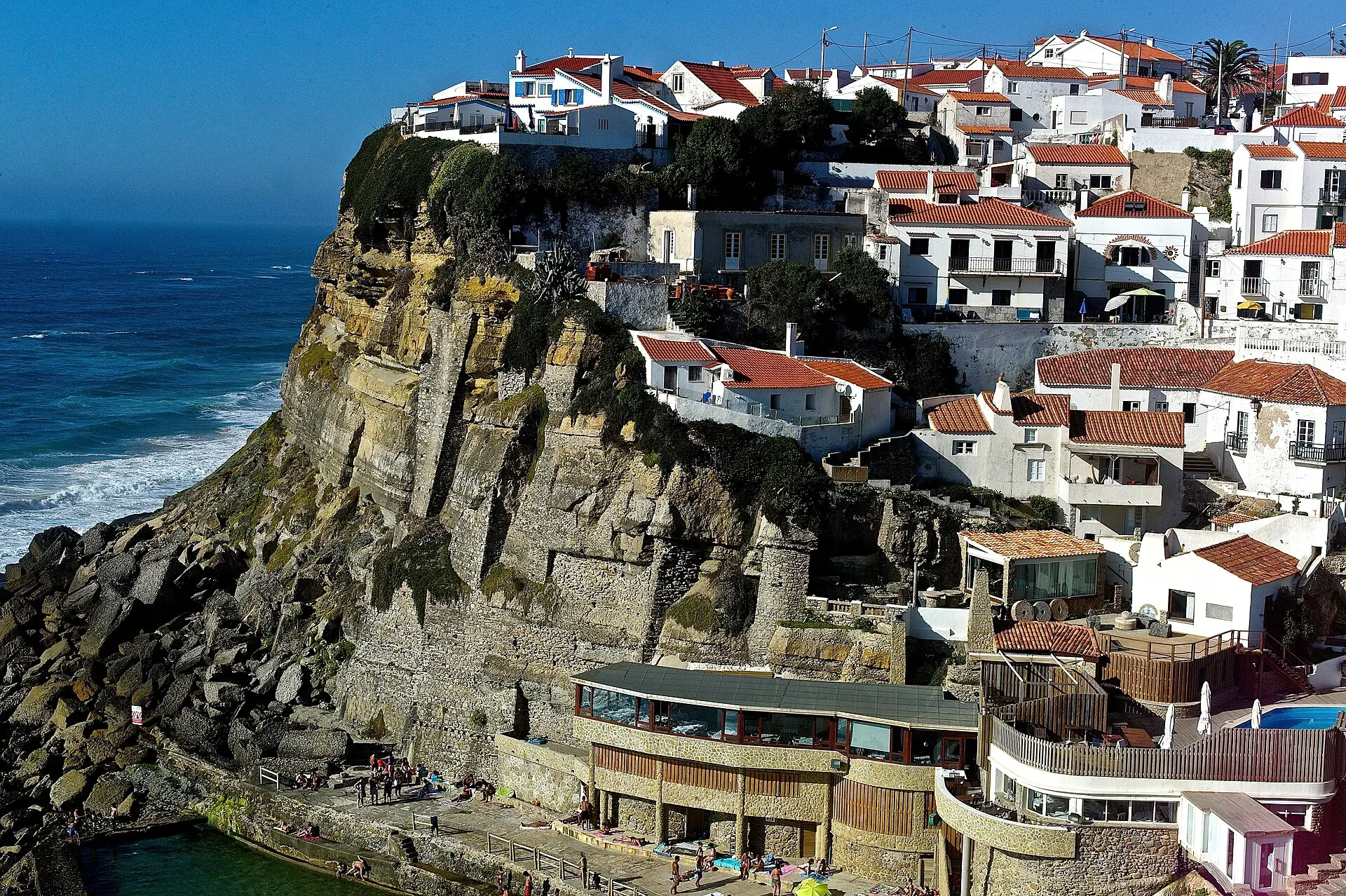 White houses of Azenhas do Mar on a cliff above the sea